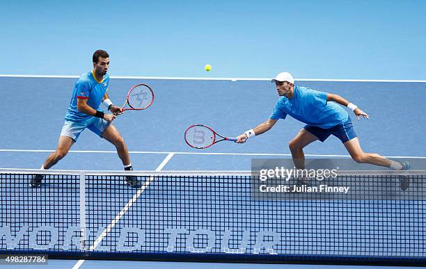 Jean-Julien Rojer of France and Horia Tecau of Romania in action during the men's doubles final against Rohan Bopanna of India and Florin Mergea of...