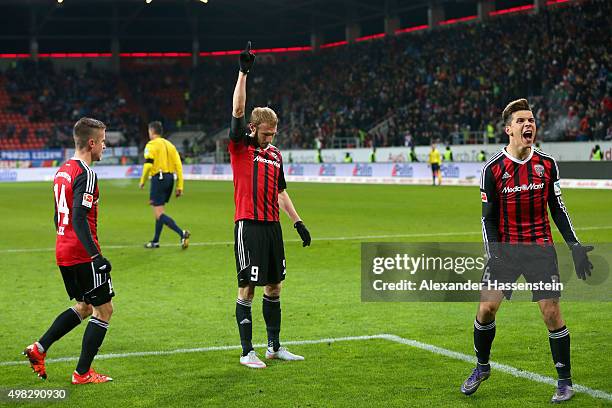 Moritz Hartmann of Ingolstadt celebrates scoring the second team goal with his team mates Alfredo Morales and Stefan Lex during the Bundesliga match...