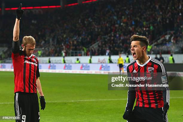 Moritz Hartmann of Ingolstadt celebrates scoring the second team goal with his team mate Alfredo Morales during the Bundesliga match between FC...