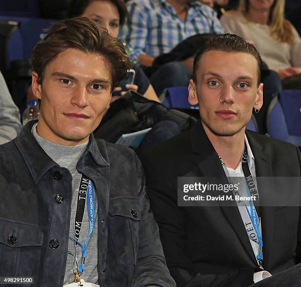 Oliver Cheshire and Jamie Campbell Bower celebrate with Moet & Chandon whilst raising a toast to the winners of the 2015 Barclays ATP World Tour...