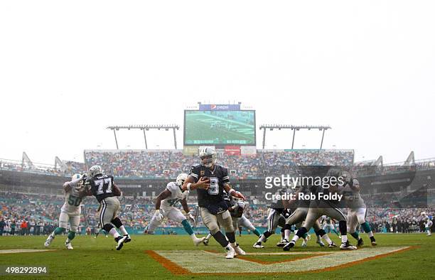 Tony Romo of the Dallas Cowboys in action during the first quarter of the game against the Miami Dolphins at Sun Life Stadium on November 22, 2015 in...