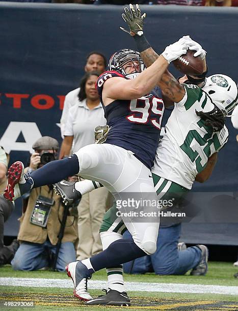 Calvin Pryor of the New York Jets has his pass broken up by J.J. Watt of the Houston Texans in the first quarter on November 22, 2015 at NRG Stadium...