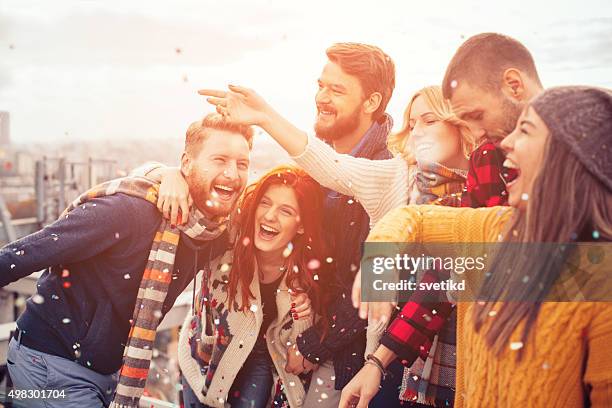 rooftop party moments. - party and winter stock pictures, royalty-free photos & images