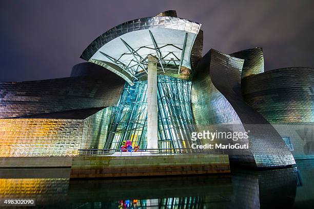 guggenheim museum, bilbao. - frank gehry stock pictures, royalty-free photos & images