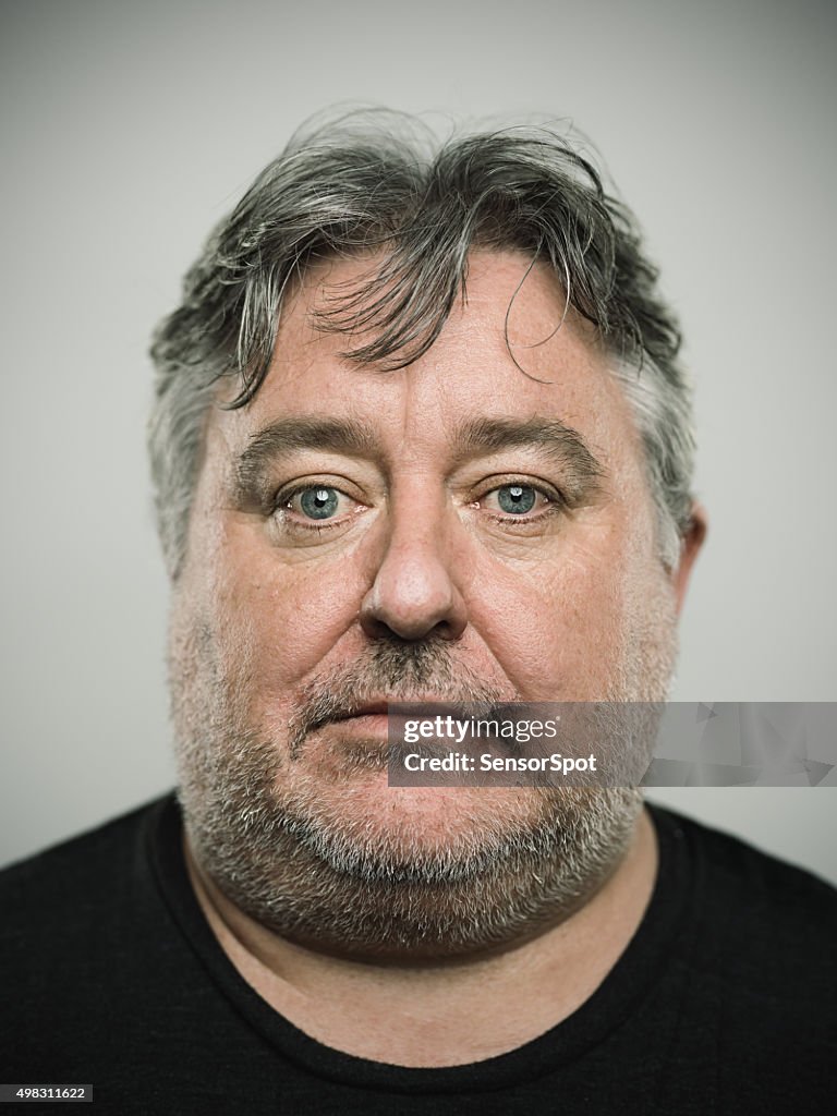 Portrait of a real english man looking at camera.