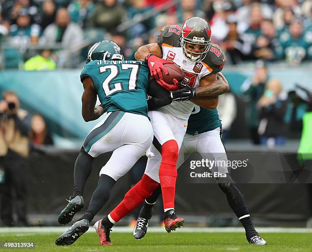 Vincent Jackson of the Tampa Bay Buccaneers scores a touchdown in the second quarter against the Malcolm Jenkins and Nolan Carroll of the...