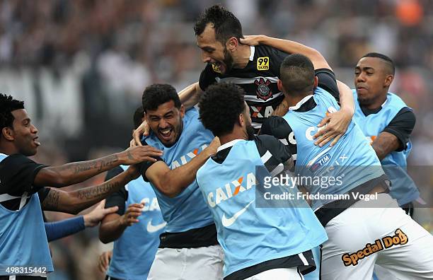 Edu Dracena of Corinthians celebrates scoring the third goal with his team during the match between Corinthians and Sao Paulo for the Brazilian...