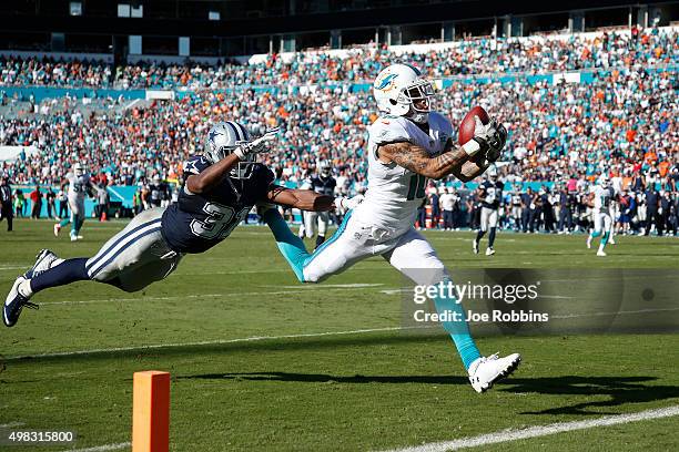 Kenny Stills of the Miami Dolphins makes a 29-yard touchdown reception against Byron Jones of the Dallas Cowboys in the third quarter of the game at...