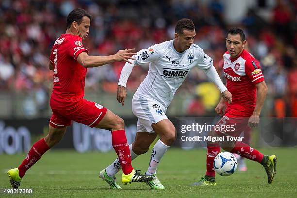 Aaron Galindo of Toluca fights for the ball with Edwin Cardona of Monterrey during the 17th round match between Toluca and Monterrey as part of the...