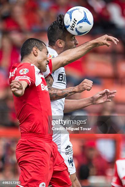 Paullo Da Silva of Toluca fights for the ball with Jesus Zavala of Monterrey during the 17th round match between Toluca and Monterrey as part of the...