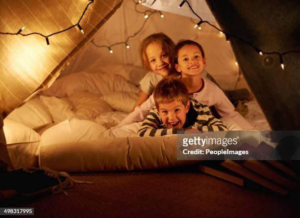 blanket fort fun! - slumber party stock pictures, royalty-free photos & images