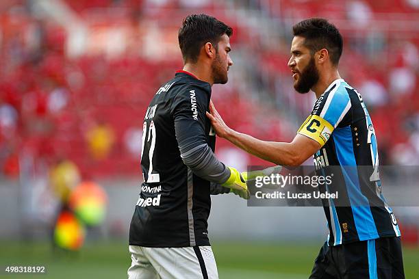 Alisson of Internacional argues with Marcelo Oliveira of Gremio during the match between Internacional and Gremio as part of Brasileirao Series A...