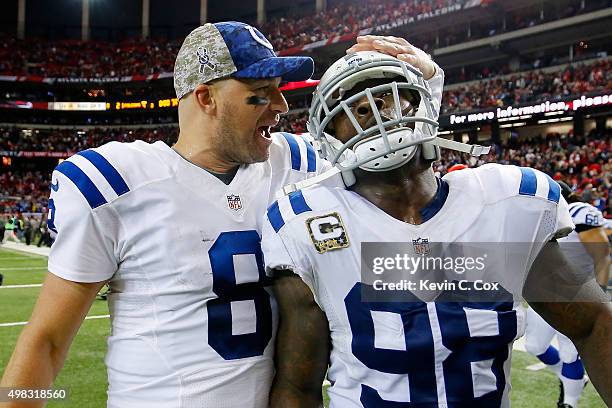 Matt Hasselbeck celebrates with Robert Mathis of the Indianapolis Colts after beating the Atlanta Falcons at the Georgia Dome on November 22, 2015 in...