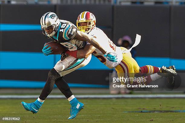 Bashaud Breeland of the Washington Redskins dives to tackle Ted Ginn of the Carolina Panthers during their game at Bank of America Stadium on...