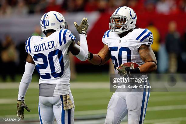Jerrell Freeman of the Indianapolis Colts celebrates with Darius Butler after recovering a fumble during the second half against the Atlanta Falcons...