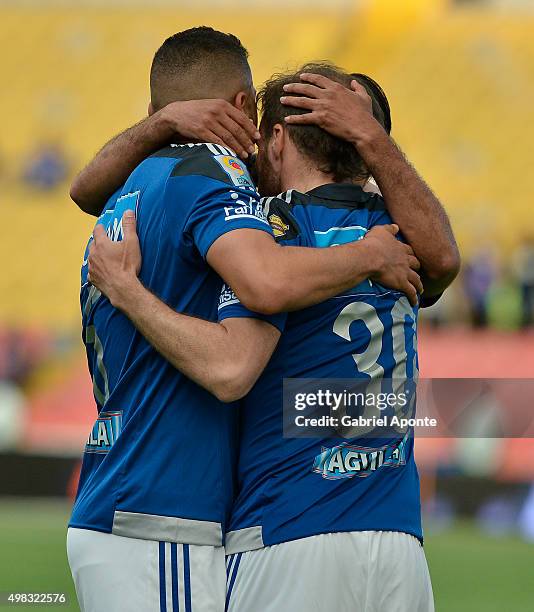 Federico Insua of Millonarios celebrates with teammates after scoring the opening goal during a match between Millonarios and Independiente Santa Fe...
