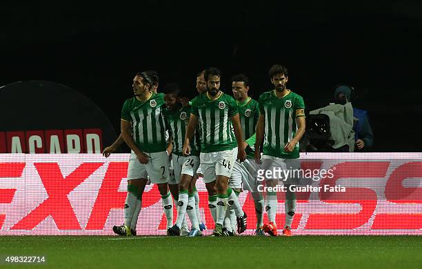 Rio Ave FC's forward Heldon celebrates with teammates after scoring a goal during the Taca de Portugal match between FC Pacos de Ferreira and Rio Ave...