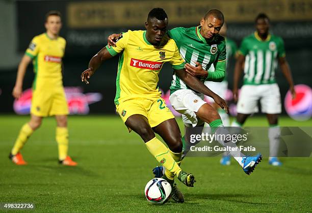 Pacos de Ferreira's midfielder Pele with Rio Ave FC's defender Edimar in action during the Taca de Portugal match between FC Pacos de Ferreira and...