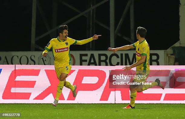 Pacos de Ferreira's defender Helder Lopes celebrates with teammate Diogo Jota after scoring a goal during the Taca de Portugal match between FC Pacos...