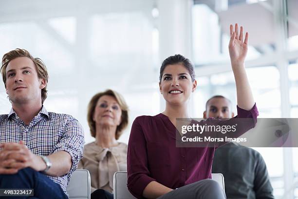 businesswoman asking question - arms raised ストックフォトと画像