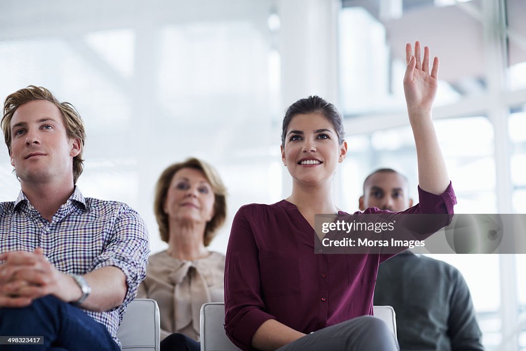 Businesswoman asking question