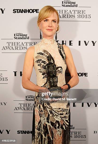 Nicole Kidman, winner of Best Actress for "Photograph 51", poses in front of the Winners Boards at The London Evening Standard Theatre Awards in...