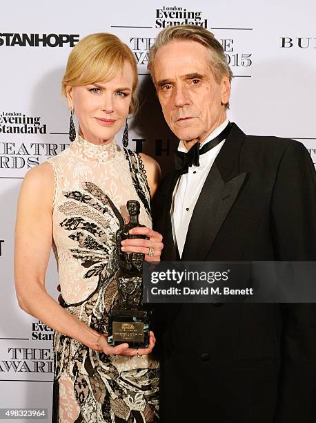 Nicole Kidman, winner of Best Actress for "Photograph 51", and Jeremy Irons pose in front of the Winners Boards at The London Evening Standard...