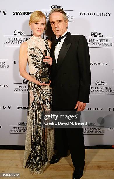 Nicole Kidman, winner of Best Actress for "Photograph 51", and Jeremy Irons pose in front of the Winners Boards at The London Evening Standard...