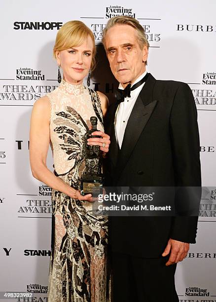 Nicole Kidman, winner of Best Actress for "Photograph 51", and Jeremy Irons pose in front of the Winners Boards at The London Evening Standard...