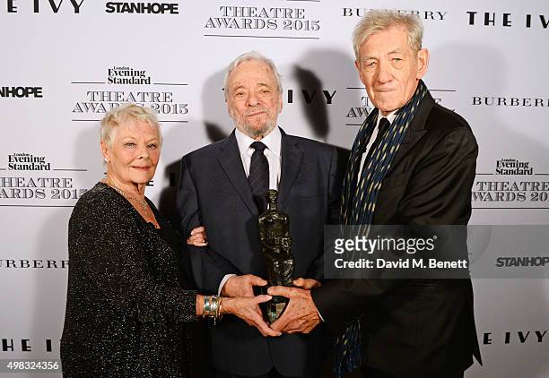 Dame Judi Dench, Stephen Sondheim, winner of the Lebedev Award, and Sir Ian McKellen pose in front of the Winners Boards at The London Evening...