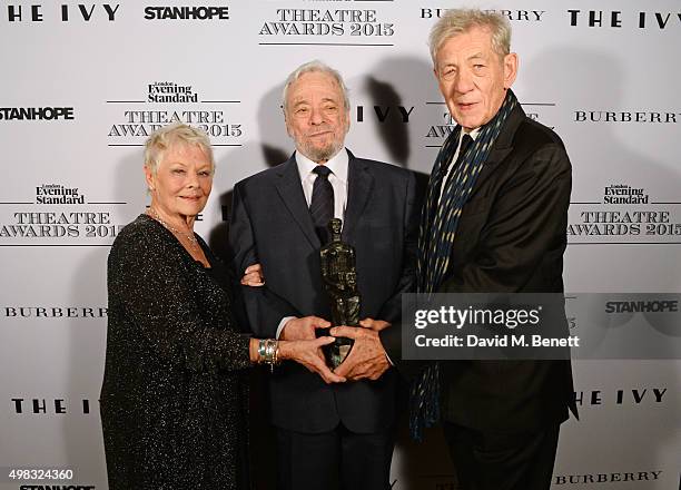 Dame Judi Dench, Stephen Sondheim, winner of the Lebedev Award, and Sir Ian McKellen pose in front of the Winners Boards at The London Evening...