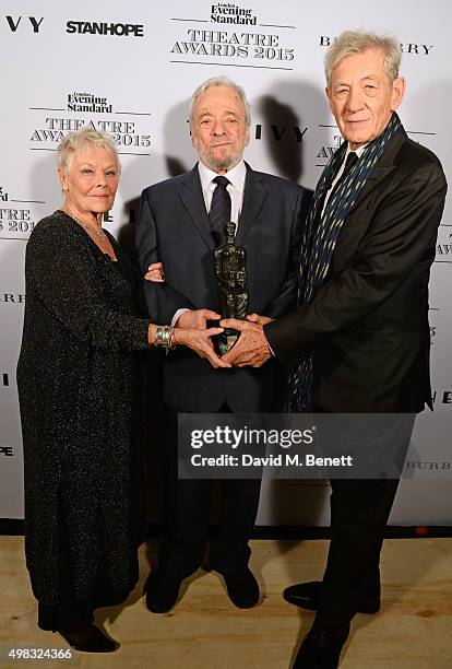 Dame Judi Dench, Stephen Sondheim, winner of the Lebedev Award, and Sir Ian McKellen pose in front of the Winners Boards at The London Evening...