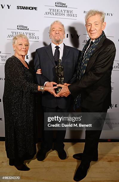 Dame Judi Dench, Stephen Sondheim, winner of the Lebedev Award, and Sir Ian McKellen pose in front of the Winners Boards at The London Evening...