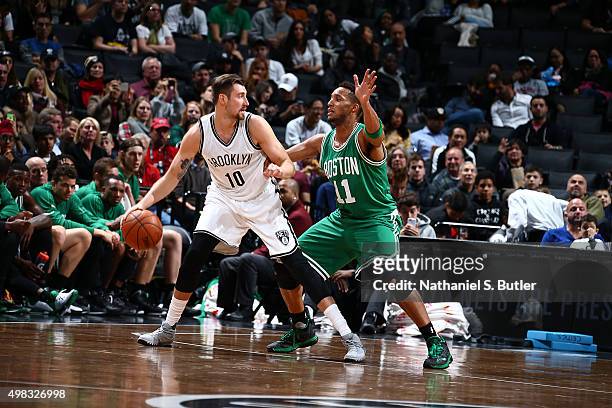 Sergey Karasev of the Brooklyn Nets handles the ball against Evan Turner of the Boston Celtics on November 22, 2015 at Barclays Center in Brooklyn,...