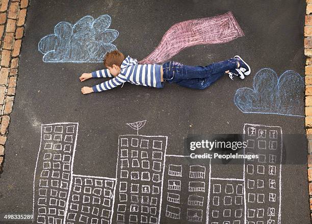 follow your dreams... - kid lying down stock pictures, royalty-free photos & images