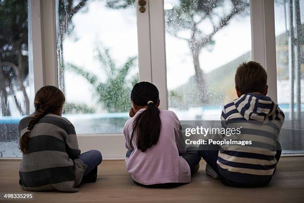 go away rain! come back another day - sad children only stock pictures, royalty-free photos & images