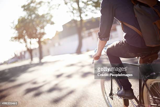 whiling away the miles - cycling stockfoto's en -beelden