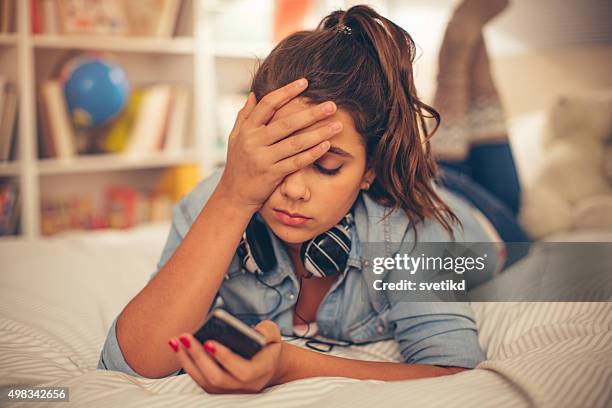 teenage girl problems. - 13 years old girl in jeans stock pictures, royalty-free photos & images