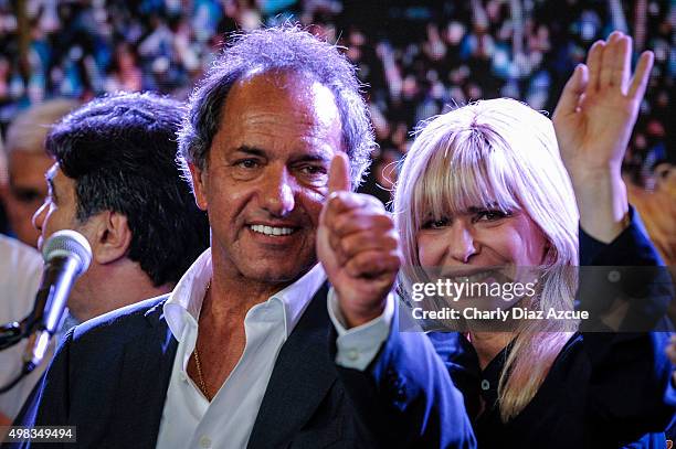 Daniel Scioli Presidential Candidate for Frente Para La Victoria and his wife Karina Rabolini greet the audience after runoff elections at Frente...