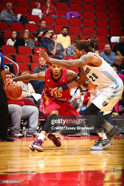Walter Lemon Jr. #15 of the Fort Wayne Mad Ants makes a move against Cartier Martin of the Iowa Energy in an NBA D-League game on November 22, 2015...