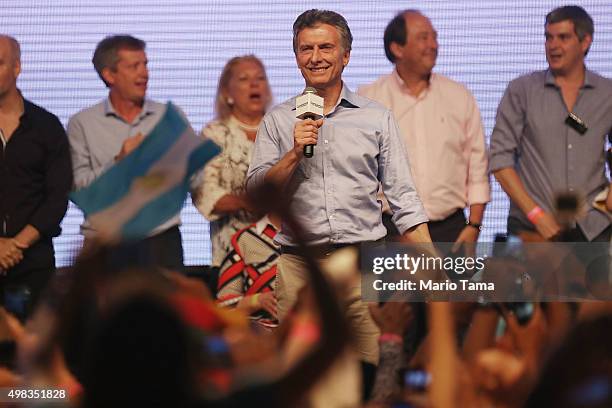 Opposition presidential candidate Mauricio Macri celebrates after defeating ruling party candidate Daniel Scioli in a runoff election on November 22,...