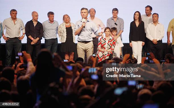 Opposition presidential candidate Mauricio Macri celebrates after defeating ruling party candidate Daniel Scioli in a runoff election on November 22,...