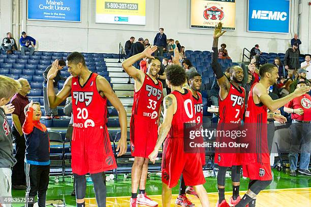 Bruna Caboclo, Walter Pitchford, Jay Harris, Nick Wiggins and Toronto Raptors 905 teammates celebrate their first win of the season, 96-87, over the...