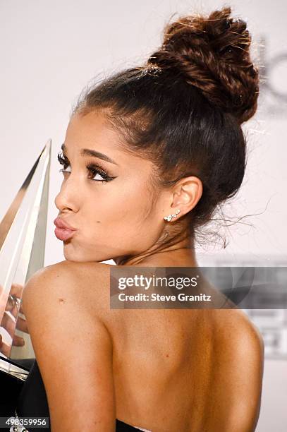 Recording artist Ariana Grande winner of the award for Favorite Pop/Rock Female Artist poses in the press room during the 2015 American Music Awards...