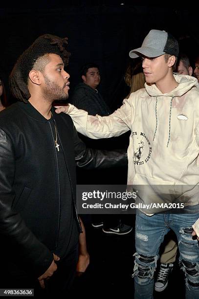 Recording artists The Weeknd and Justin Bieber attend the 2015 American Music Awards at Microsoft Theater on November 22, 2015 in Los Angeles,...