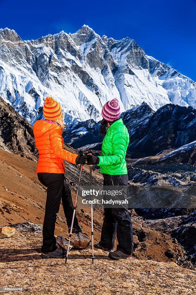 Women trekking in Himalayas, Mount Everest National Park