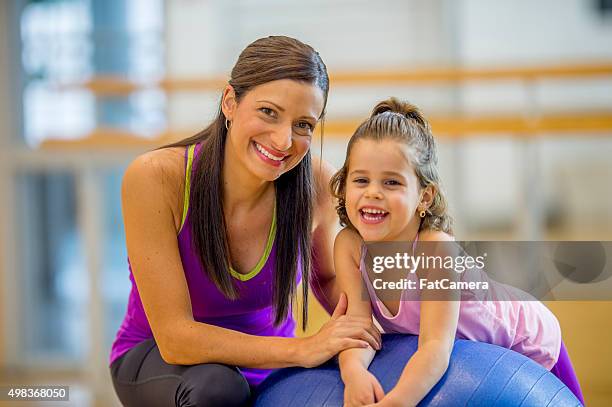 mother and daughter playing at the gym - kids in undies stock pictures, royalty-free photos & images