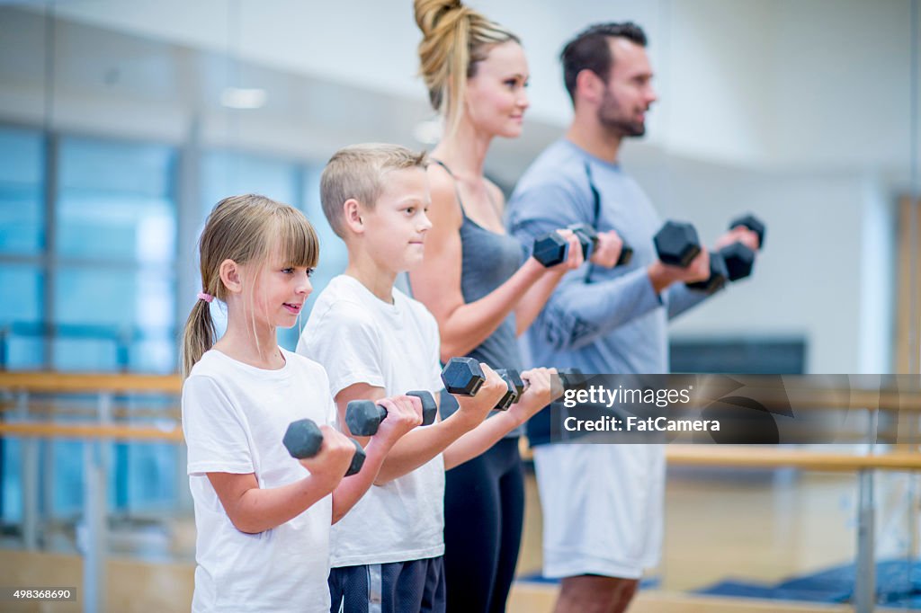 Family Lifting Weights Together