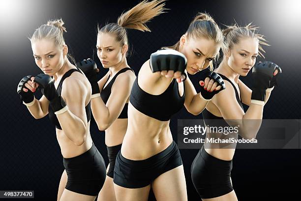 sequence image punching of a women fighter in the cage - fighter portraits 2015 stockfoto's en -beelden