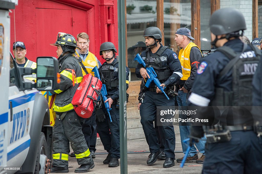 NYPD counter terrorism officers carrying simulated machine...
